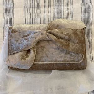 Anthropologie Crushed Velvet Bow Clutch in Gold